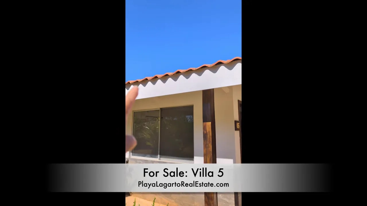 Front roofline, eaves, patio columns, and sliding glass doors